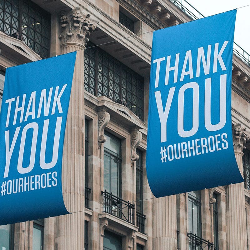 Thank you heros hanging banner over city streets