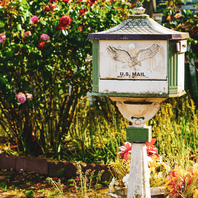 US MAIL Mailbox in a yard