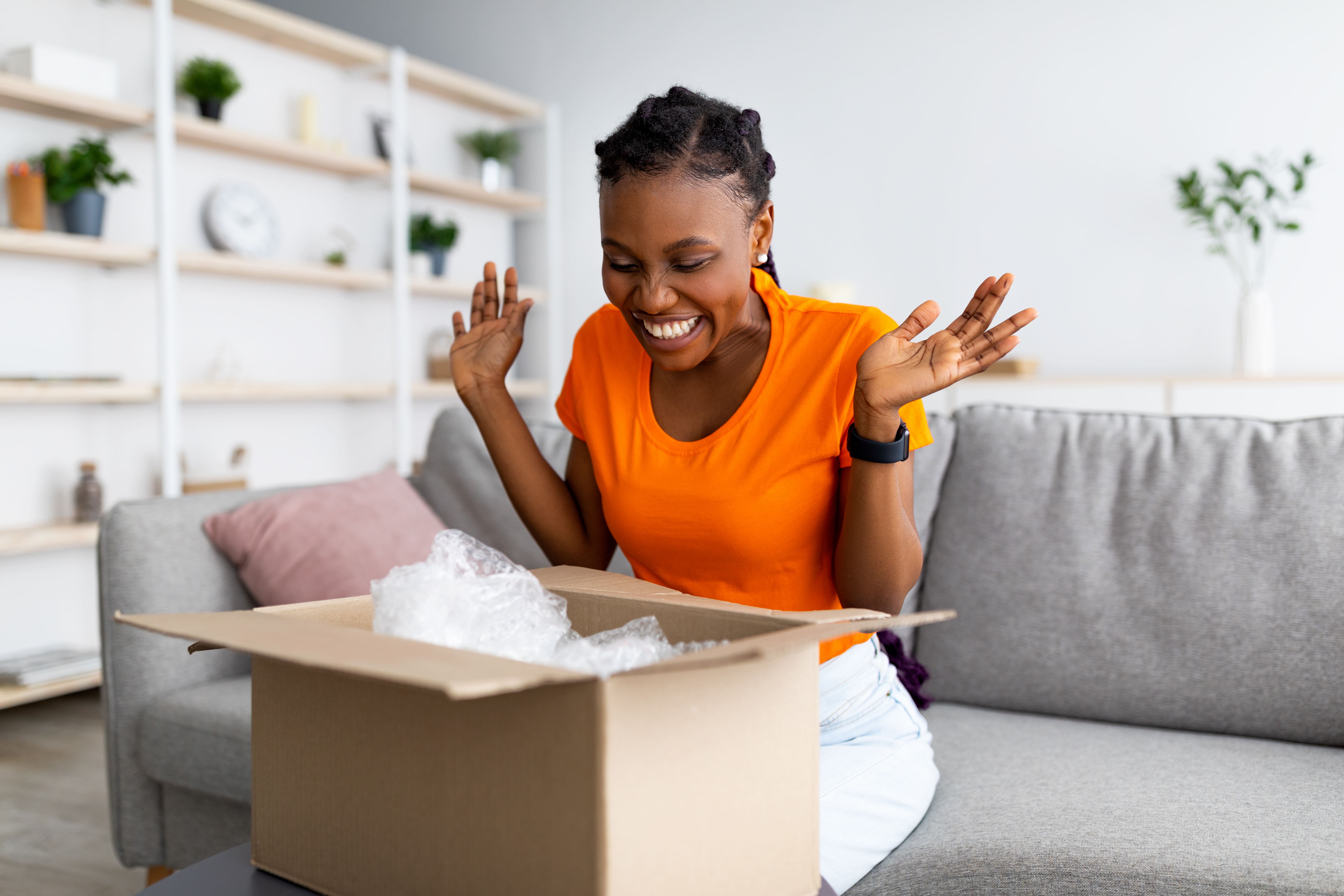 woman unboxing a delivery