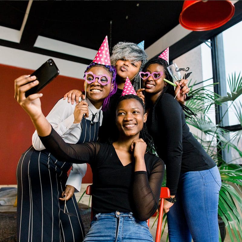 employees smiling at holiday party