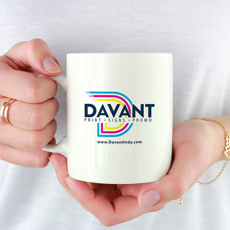 woman holding customized coffee cup by davant